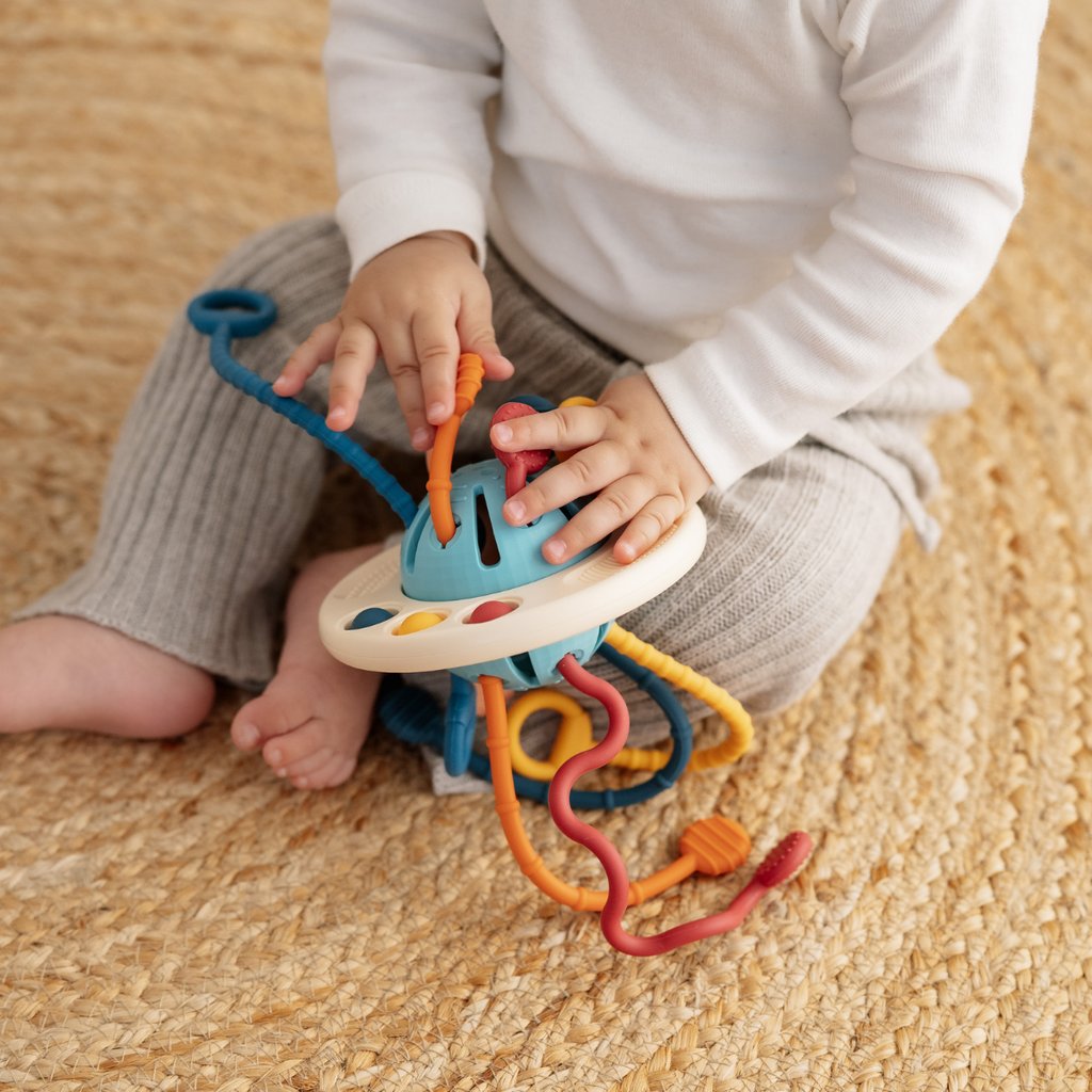 UFO-Raumschiff-Sinnesspiel für Babys